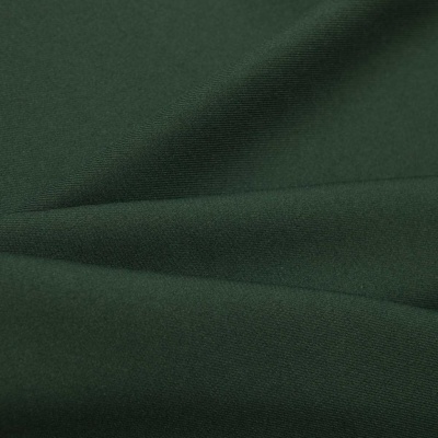 Ткань костюмная 21010 2076, 225 гр/м2, шир.150см, цвет т.зеленый - купить в Сургуте. Цена 394.71 руб.
